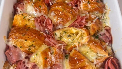 Delicious flaky croissant bake topped with chocolate and berries