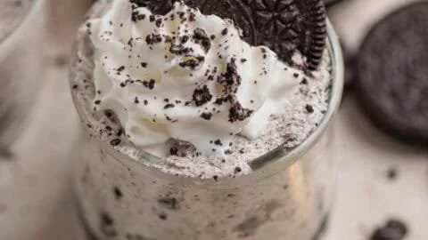Oreo No-Bake Cheesecake Cups served in clear dessert cups