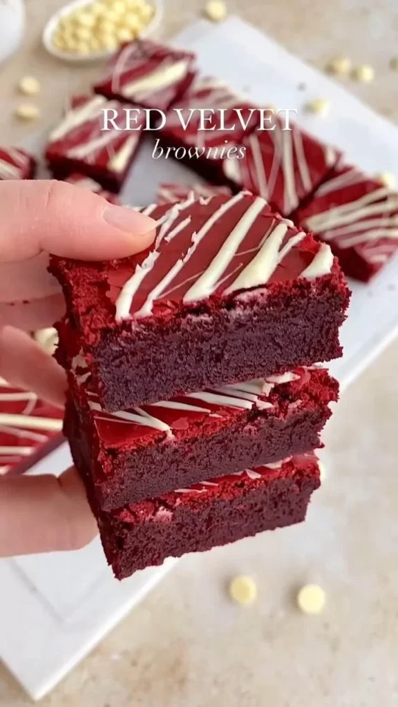 Delicious Red Velvet Brownies topped with cream cheese frosting