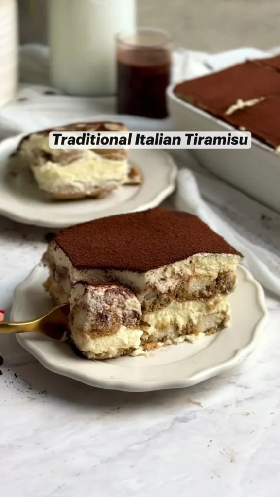 Deliciously layered Tiramisu dessert with coffee and mascarpone cream.